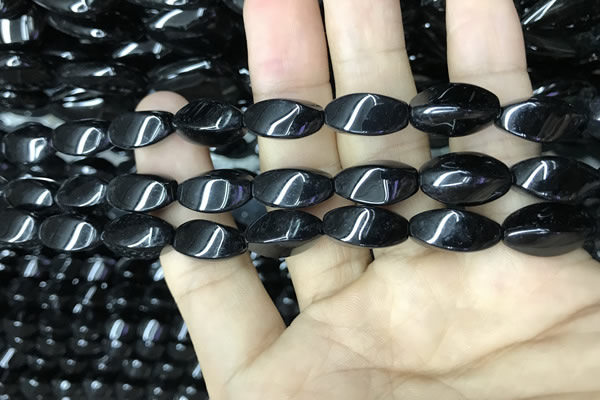 CAA2482 15.5 inches 6*12mm twisted rice black agate beads