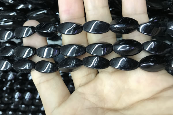 CAA2483 15.5 inches 8*16mm twisted rice black agate beads