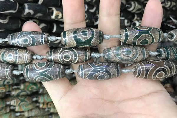CAA2687 15.5 inches 12*30mm - 14*30mm rice tibetan agate dzi beads