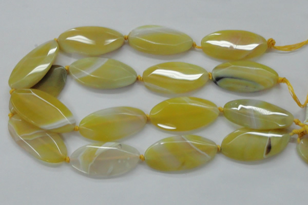 CAA325 15.5 inches 25*50mm faceted marquise yellow line agate beads