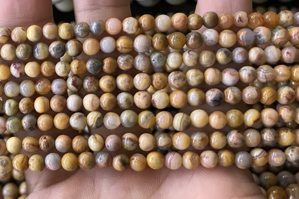 CAA3601 15.5 inches 4mm round yellow crazy lace agate beads