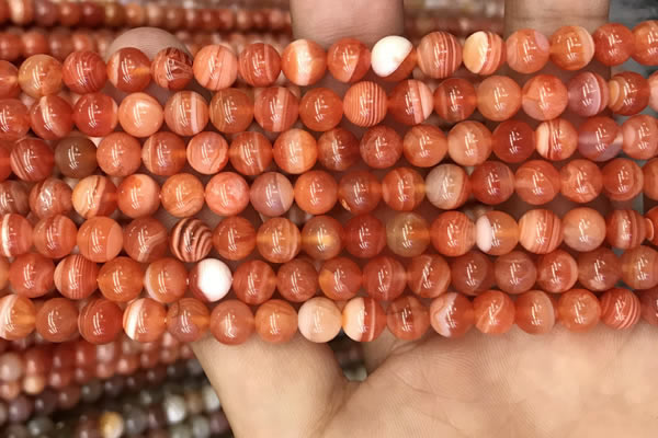 CAA3761 15.5 inches 6mm round red botswana agate beads wholesale