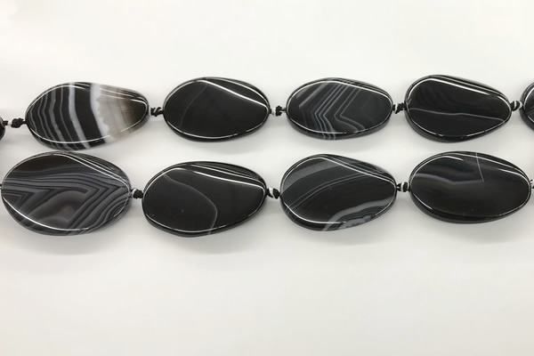 CAA4304 15.5 inches 30*40mm twisted oval line agate beads