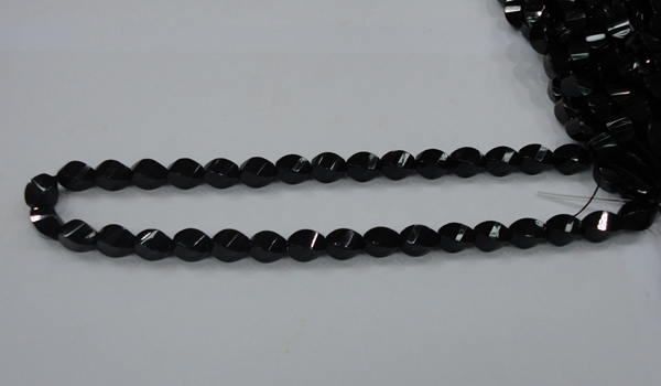 CAB335 15.5 inches 8*12mm faceted & twisted rice black agate beads