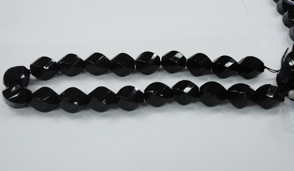 CAB337 15.5 inches 15*20mm faceted & twisted rice black agate beads