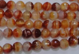 CAG2701 15.5 inches 6mm faceted round red line agate beads