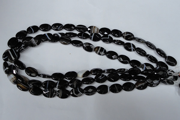 CAG3081 15.5 inches 10*14mm faceted oval black line agate beads