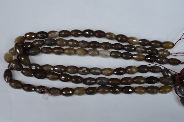 CAG3129 15.5 inches 10*14mm faceted rice brown line agate beads