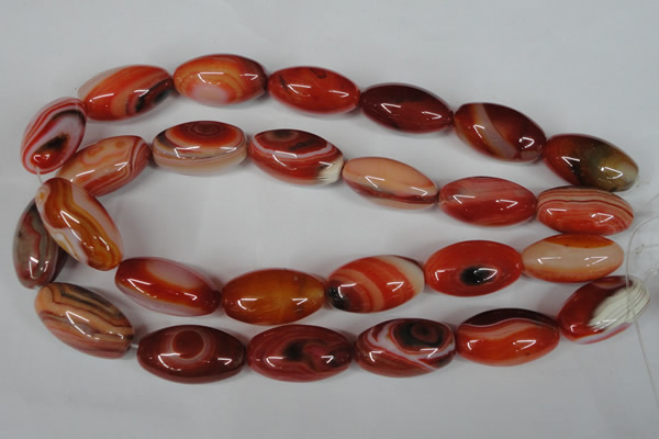 CAG3274 15.5 inches 16*30mm rice red line agate beads