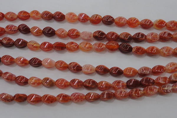 CAG4184 15.5 inches 6*10mm twisted rice natural fire agate beads