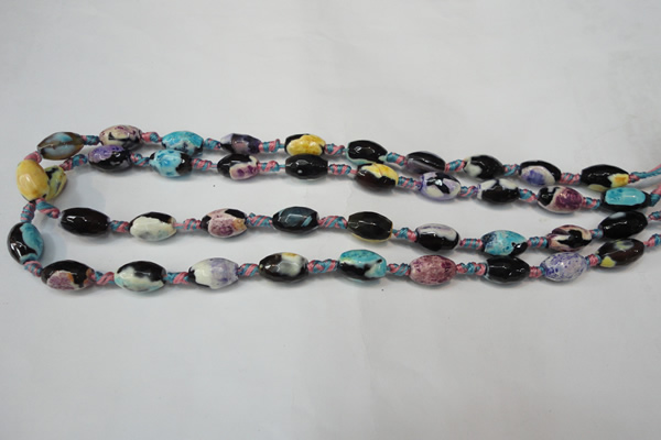 CAG5772 15 inches 8*12mm faceted rice fire crackle agate beads