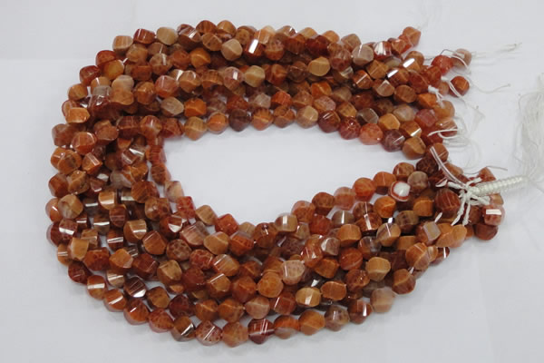 CAG582 15.5 inches 10*14mm faceted & twisted rice natural fire agate beads
