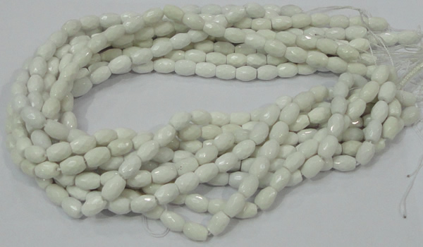 CAG721 15.5 inches 8*10mm faceted rice white agate gemstone beads