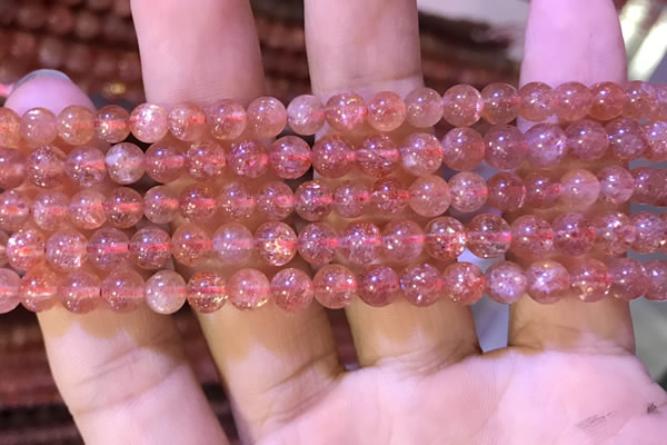 CBQ559 15.5 inches 6mm round golden strawberry quartz beads