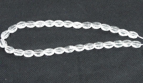 CCC262 15.5 inches 10*14mm faceted rice grade A natural white crystal beads