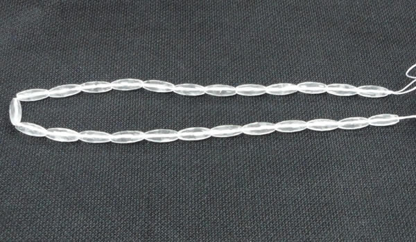 CCC265 6*16mm faceted rice grade A natural white crystal beads