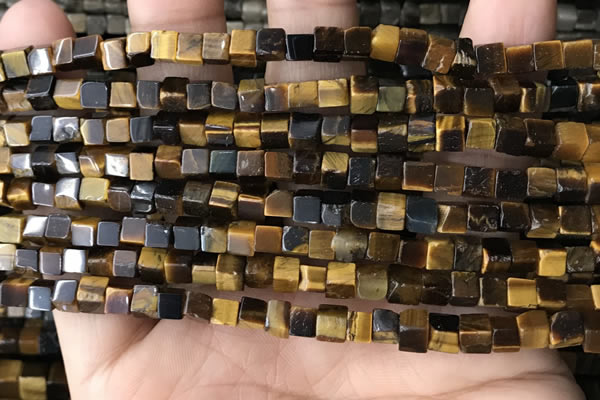 CCU464 15.5 inches 4*4mm cube yellow tiger eye beads wholesale