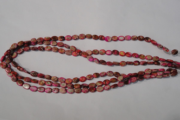 CDE781 15.5 inches 6*8mm oval dyed sea sediment jasper beads