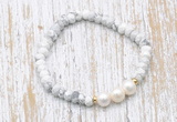 CFB701 faceted rondelle white howlite & potato white freshwater pearl stretchy bracelet
