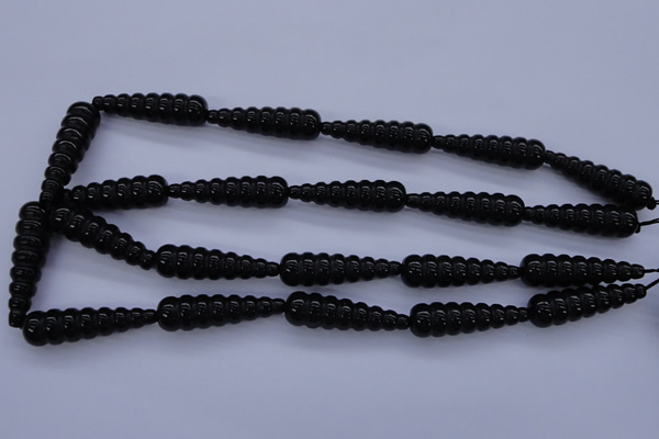 CFG761 15.5 inches 10*35mm carved teardrop black agate beads