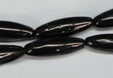 CJB54 15.5 inches 10*30mm rice natural jet gemstone beads