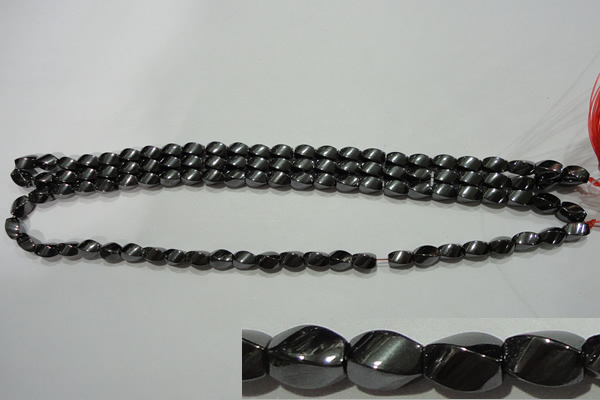 CMH151 15.5 inches 5*8mm twisted rice magnetic hematite beads
