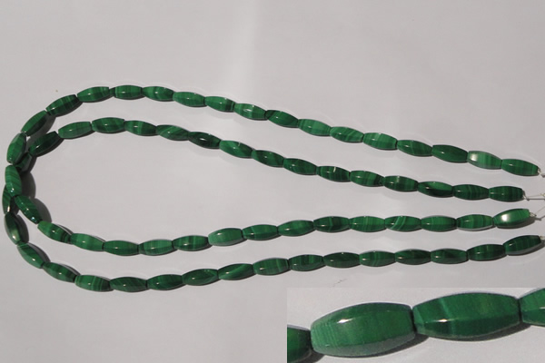 CMN224 15.5 inches 5*12mm faceted rice natural malachite beads