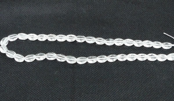CNC61 15.5 inches 8*10mm faceted rice grade A natural white crystal beads