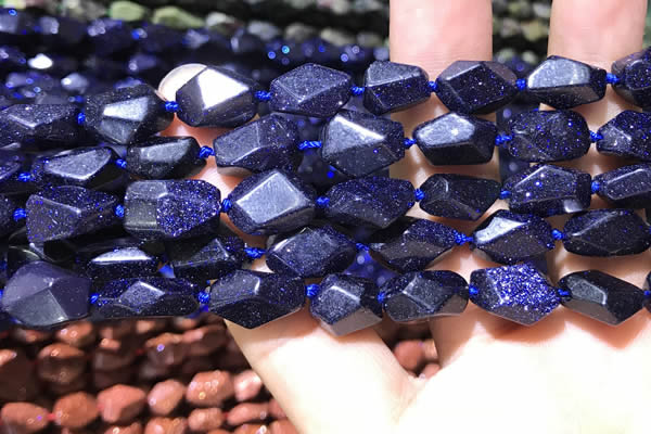 CNG7143 15.5 inches 6*10mm - 10*14mm faceted nuggets blue glodstone beads