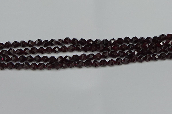 CNG7275 15.5 inches 6mm faceted nuggets red garnet beads