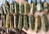 CNG7938 15.5 inches 10*22mm - 12*45mm faceted nuggets rhyolite beads
