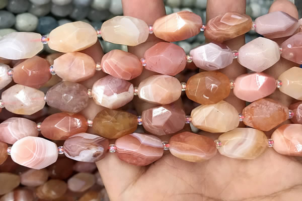 CNG7994 12*16mm - 13*18mm faceted nuggets pink Botswana agate beads
