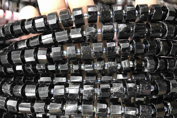 CRB2102 15.5 inches 11mm - 12mm faceted tyre black tourmaline beads