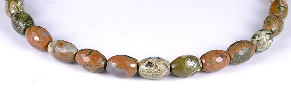 CRH02 10*14mm faceted rice natural rhyolite beads Wholesale