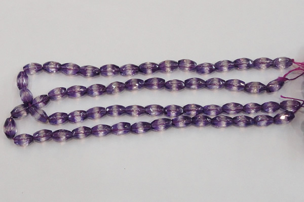 CSA25 15.5 inches 7*12mm faceted rice synthetic amethyst beads