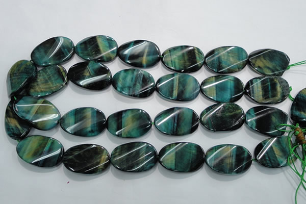 CTE1079 15.5 inches 22*30mm twisted oval dyed green tiger eye beads