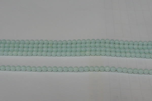 CTU2563 15.5 inches 4mm round synthetic turquoise beads