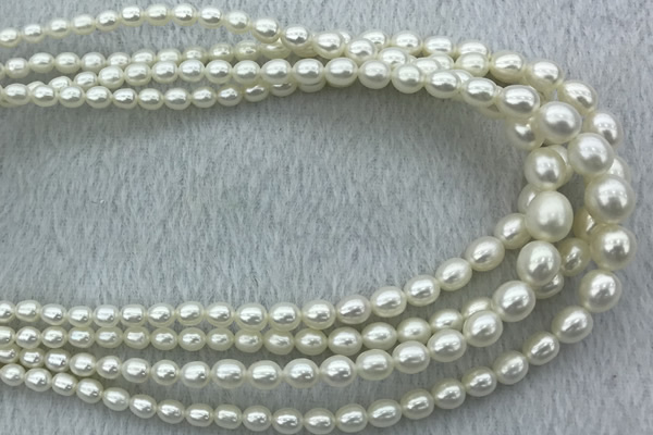 FWP212 15 inches 4mm - 9mm rice white freshwater pearl strands