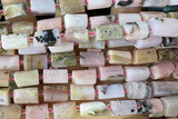 TUBE110 15 inches 6*11mm - 8*14mm faceted tube pink opal beads