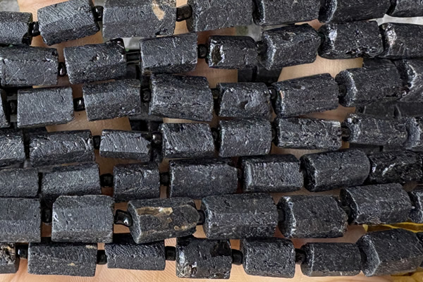 TUBE122 15 inches 6*11mm - 8*14mm faceted tube black tourmaline beads